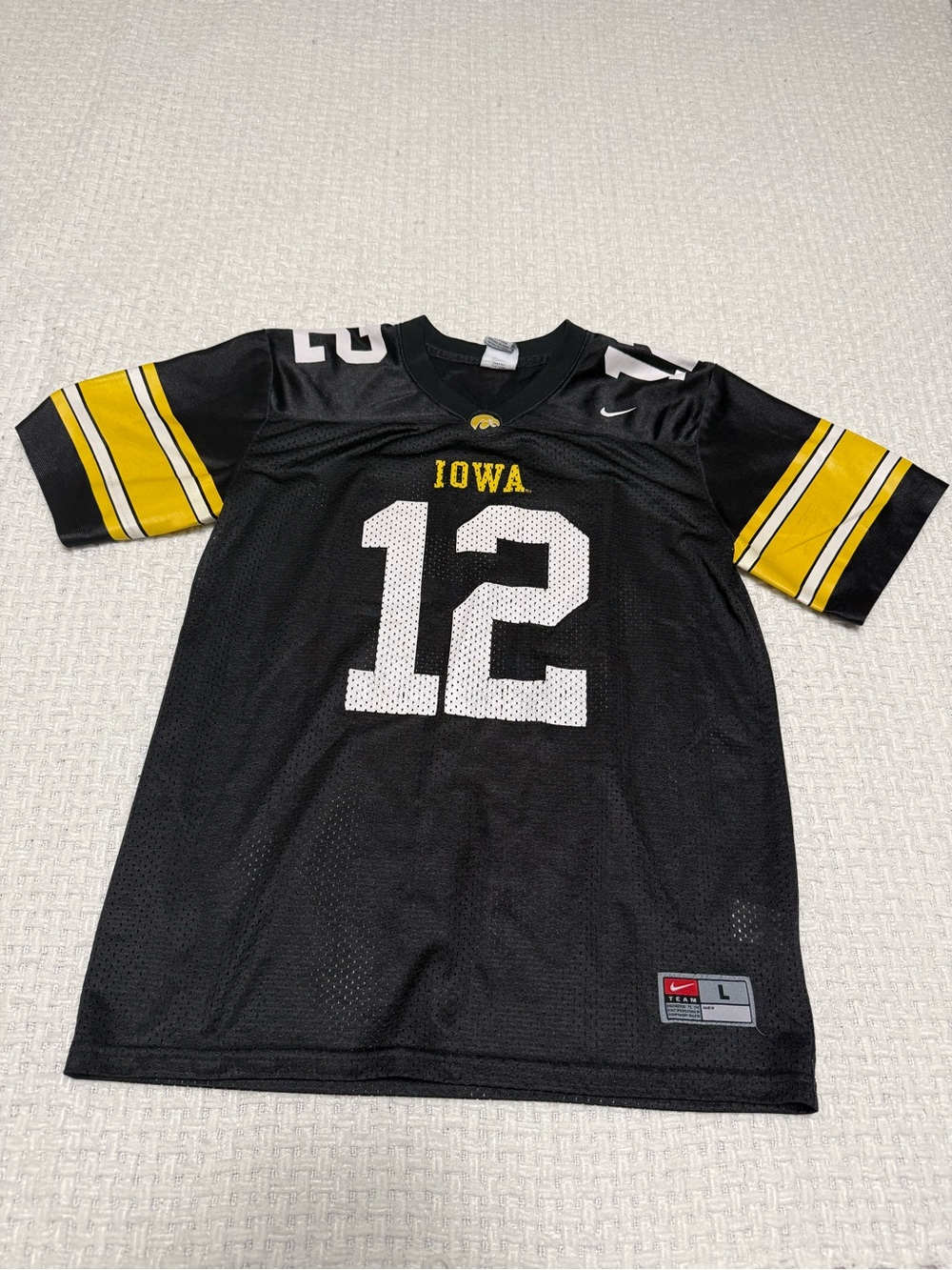 Iowa Hawkeyes youth large Nike football jersey, #12 💛🖤🏈